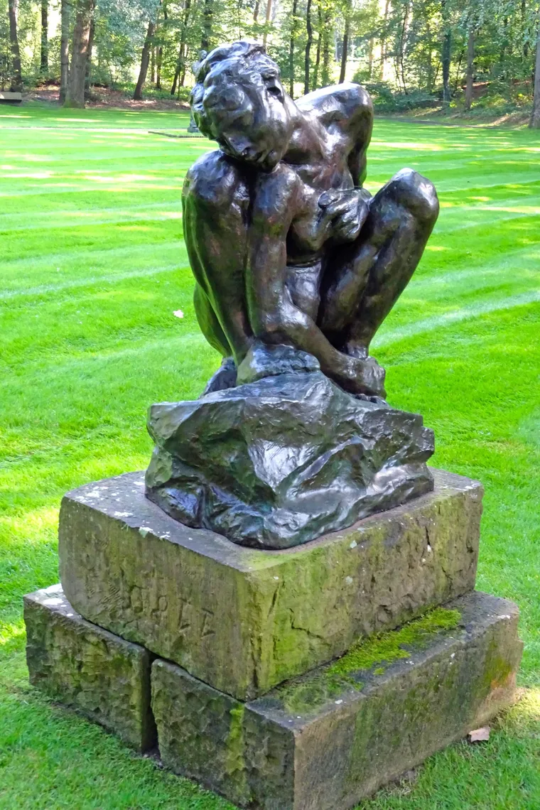 Squatting Woman