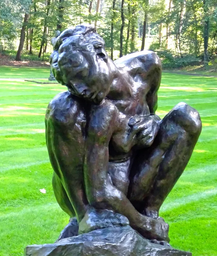 Squatting Woman