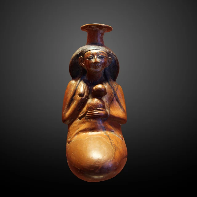 Vaso em forma de mulher amamentando uma criança