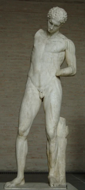 Atleta che versa l'olio