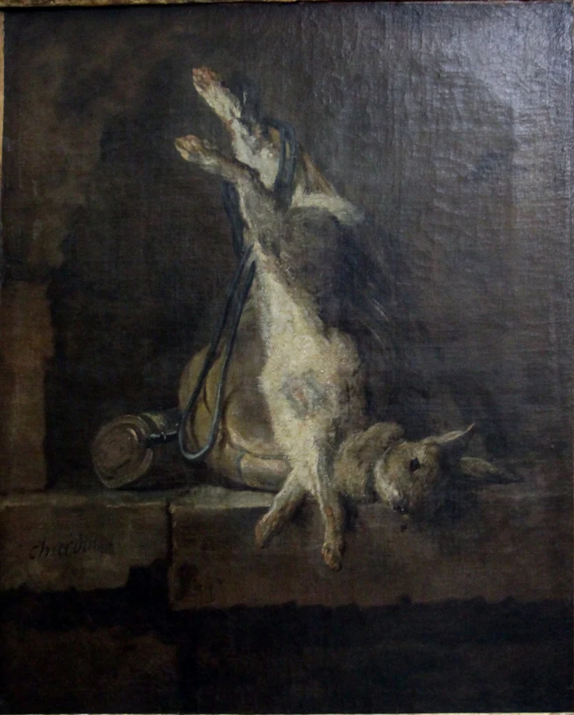 Totes Kaninchen mit Jagdgerät