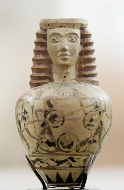 Protocorinthian Plastic Aryballos with a Woman's Head and a Hoplite Battle