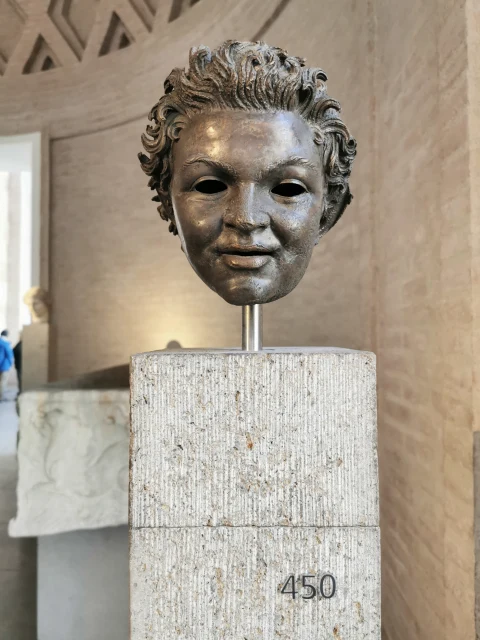 Bronze Head of a Young Satyr