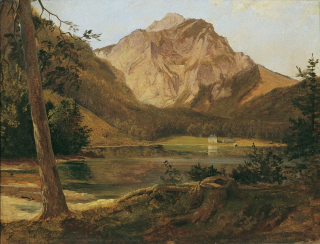 The Lake Vorderer Langbathsee with the Höllengebirge Mountains