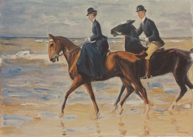 Two riders on the beach