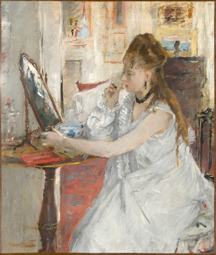 Young woman powdering