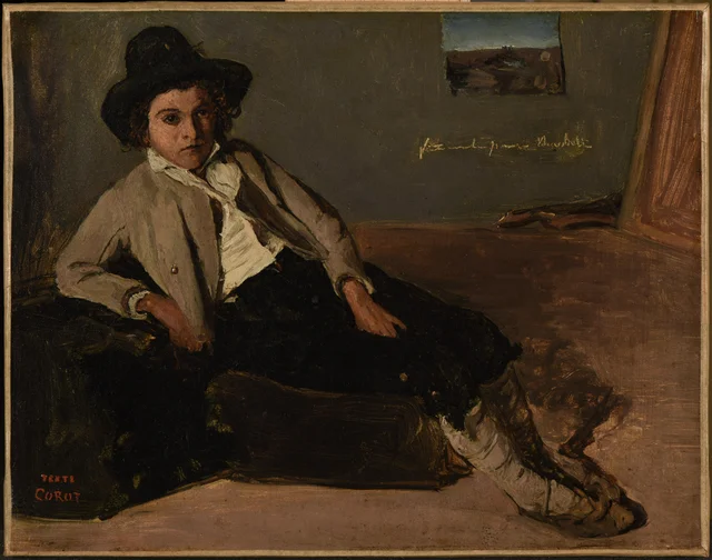 Young Italian man sitting