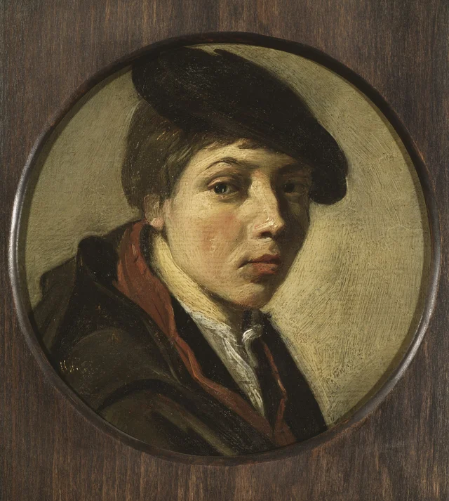 Round portrait of a boy with beret