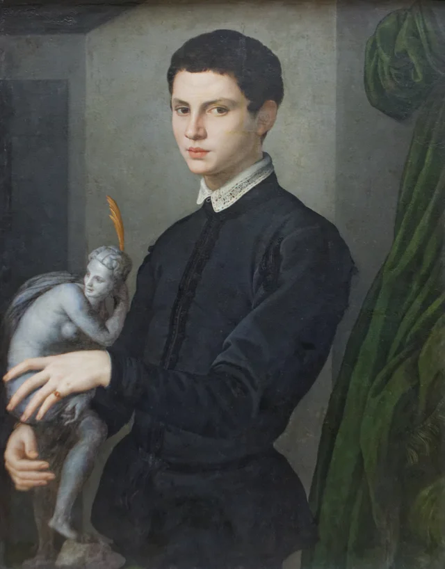 Portrait of a Man Holding a Statuette