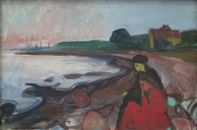 Strand mit zwei sitzenden Frauen