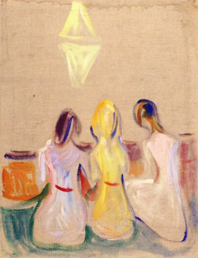 Tre giovani donne sedute