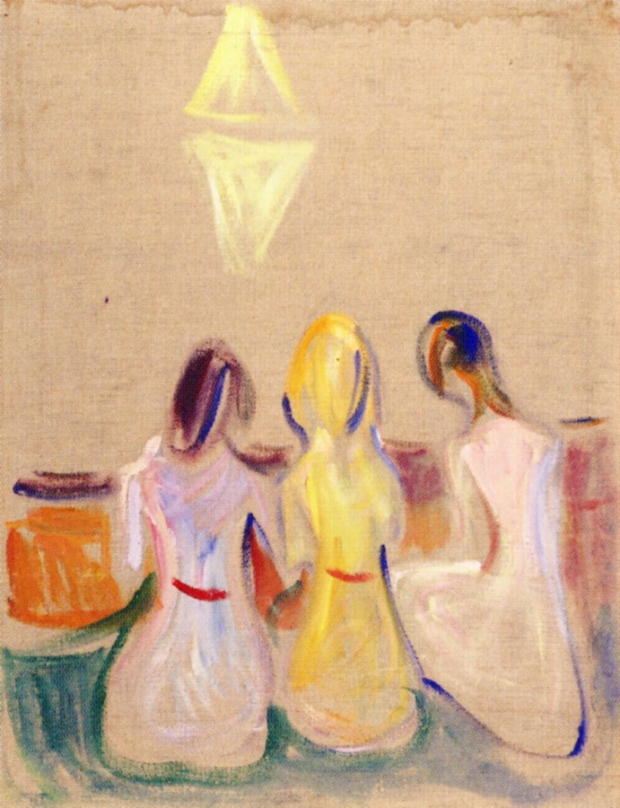 Tre giovani donne sedute
