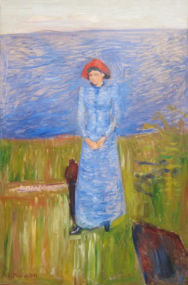 Woman in Blue against Blue Water