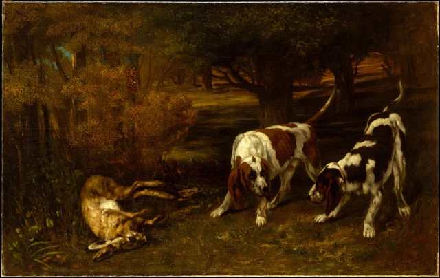 Cães de caça com lebre morta