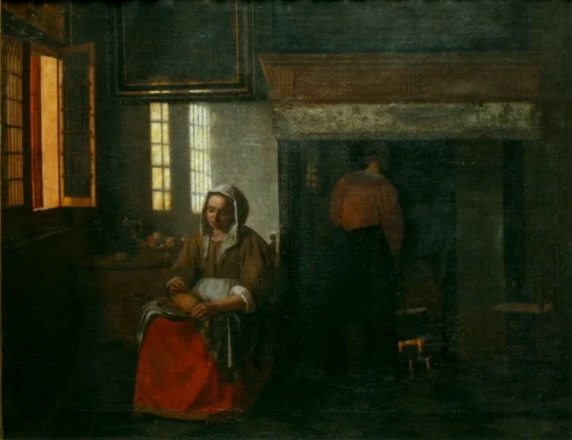 Woman plucking a duck