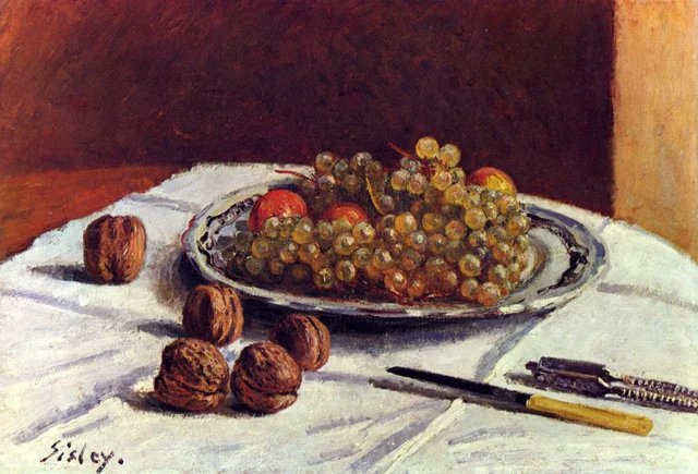 Grapes and Walnuts on a Table