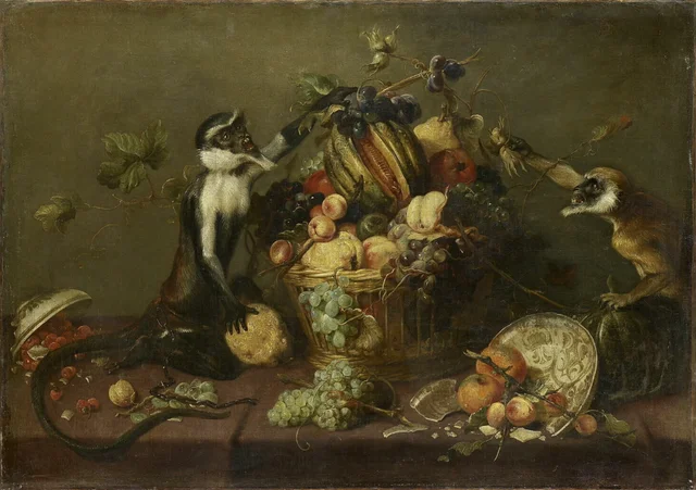 Two monkeys raiding a fruit basket