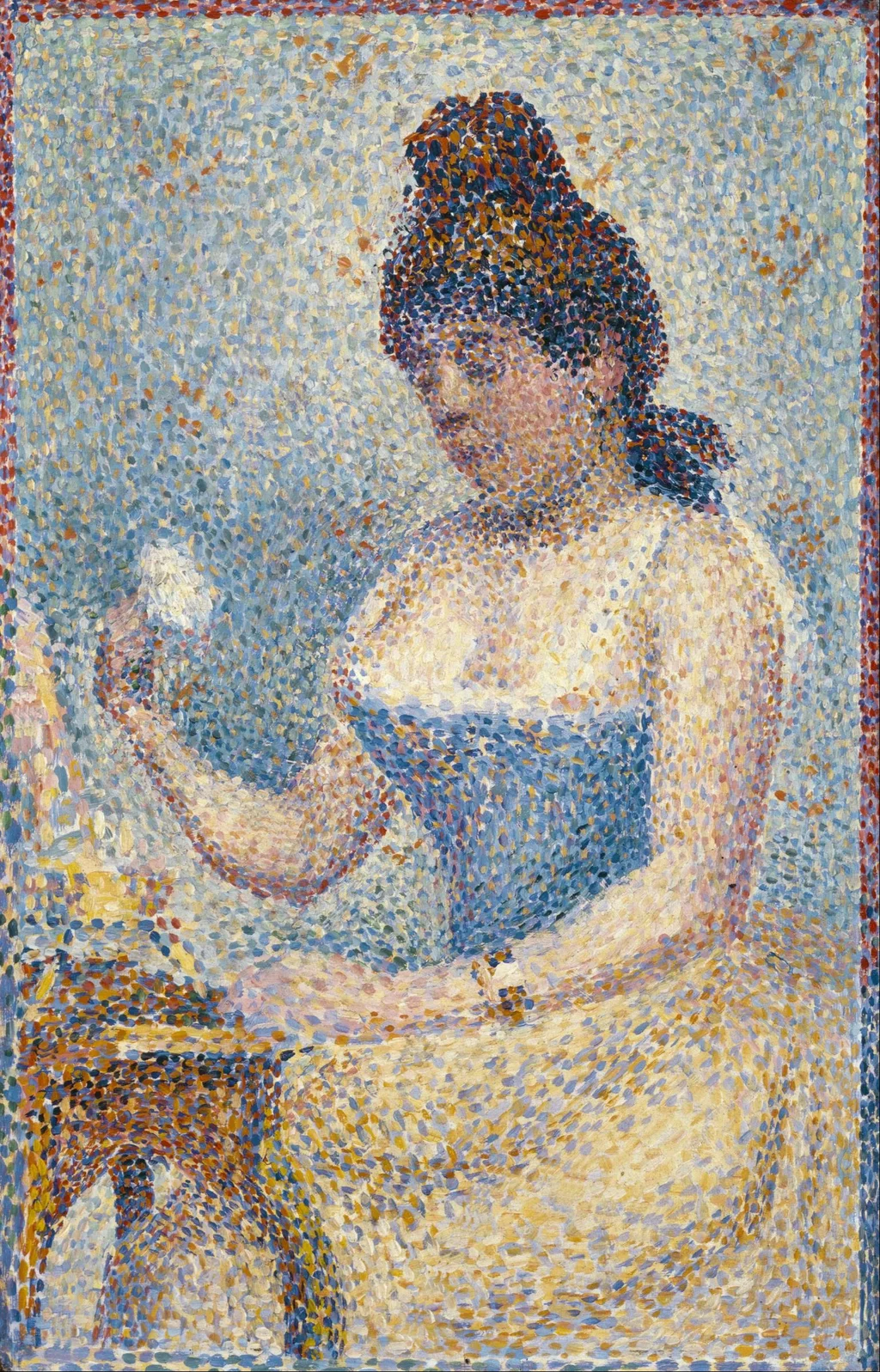 Giovane donna che si incipria (studio)