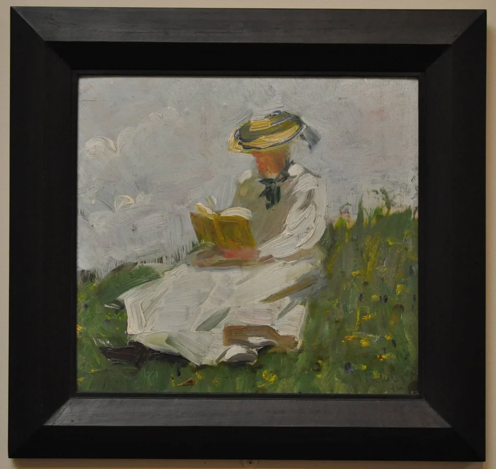Donna che legge in verde
