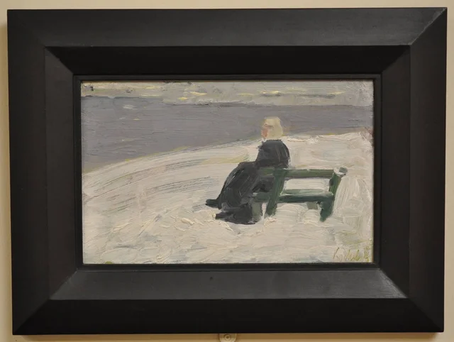Woman in Winter Landscape on a Green Seat