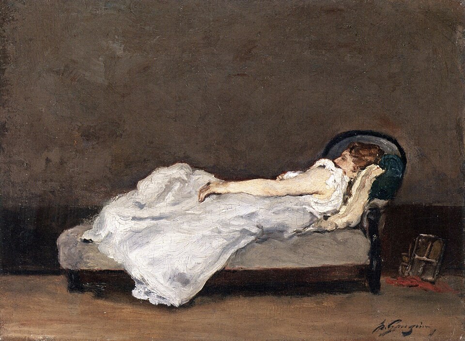 Mette dormida en un sofá