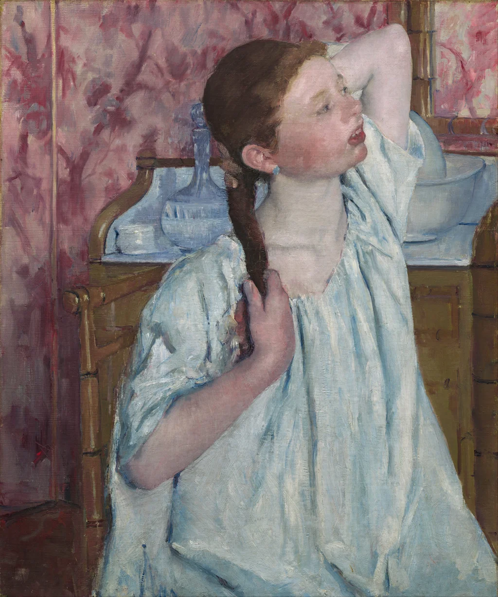 Girl Arranging Her Hair