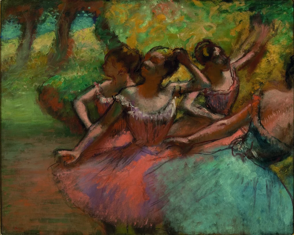 Cuatro bailarinas en escena