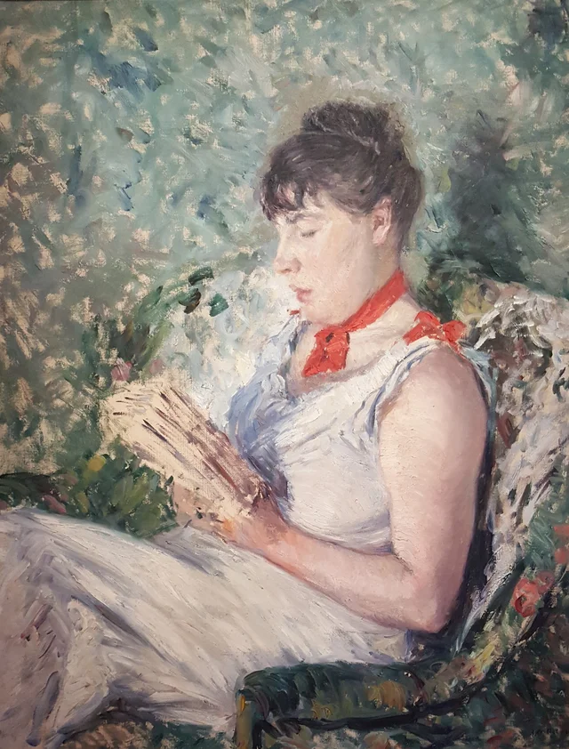 Portrait d'une femme assise lisant
