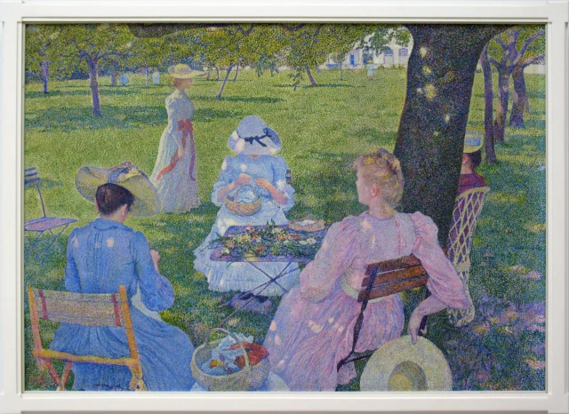 A family gathering in an orchard